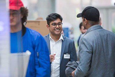 Two people meeting at a career fair