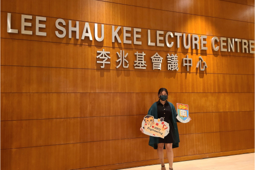 Tina holding an I love HKU Engineering sign