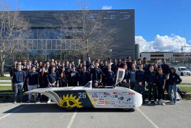 Team photo with solar car.